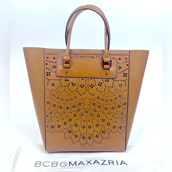 BCBGMaxAzria Handbags - NWOT BCBG Laser-Cut Tote Bag